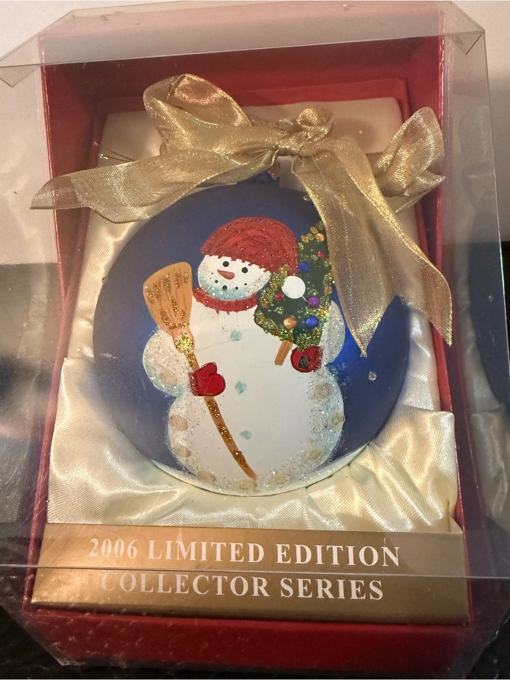Hand-Painted Blue Snowman Holiday Ornament.